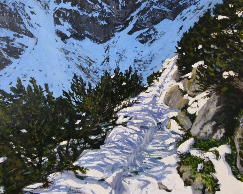 Obraz ukazujący zimowy widok ośnieżonego szlaku górskiego na Szpiglasową Przełęcz