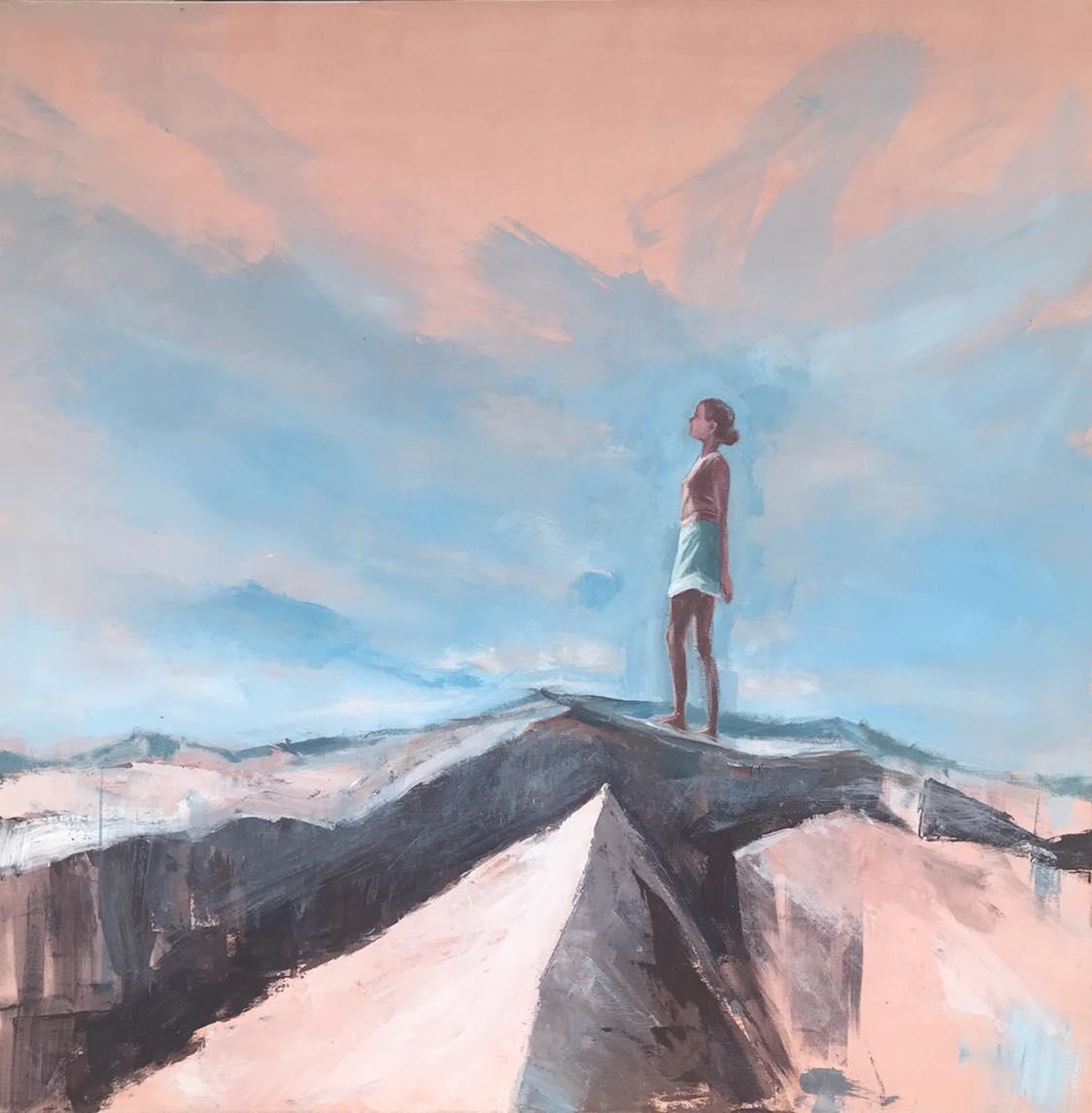 młoda dziewczyna stojąca na skałach wpatrzona w horyzont