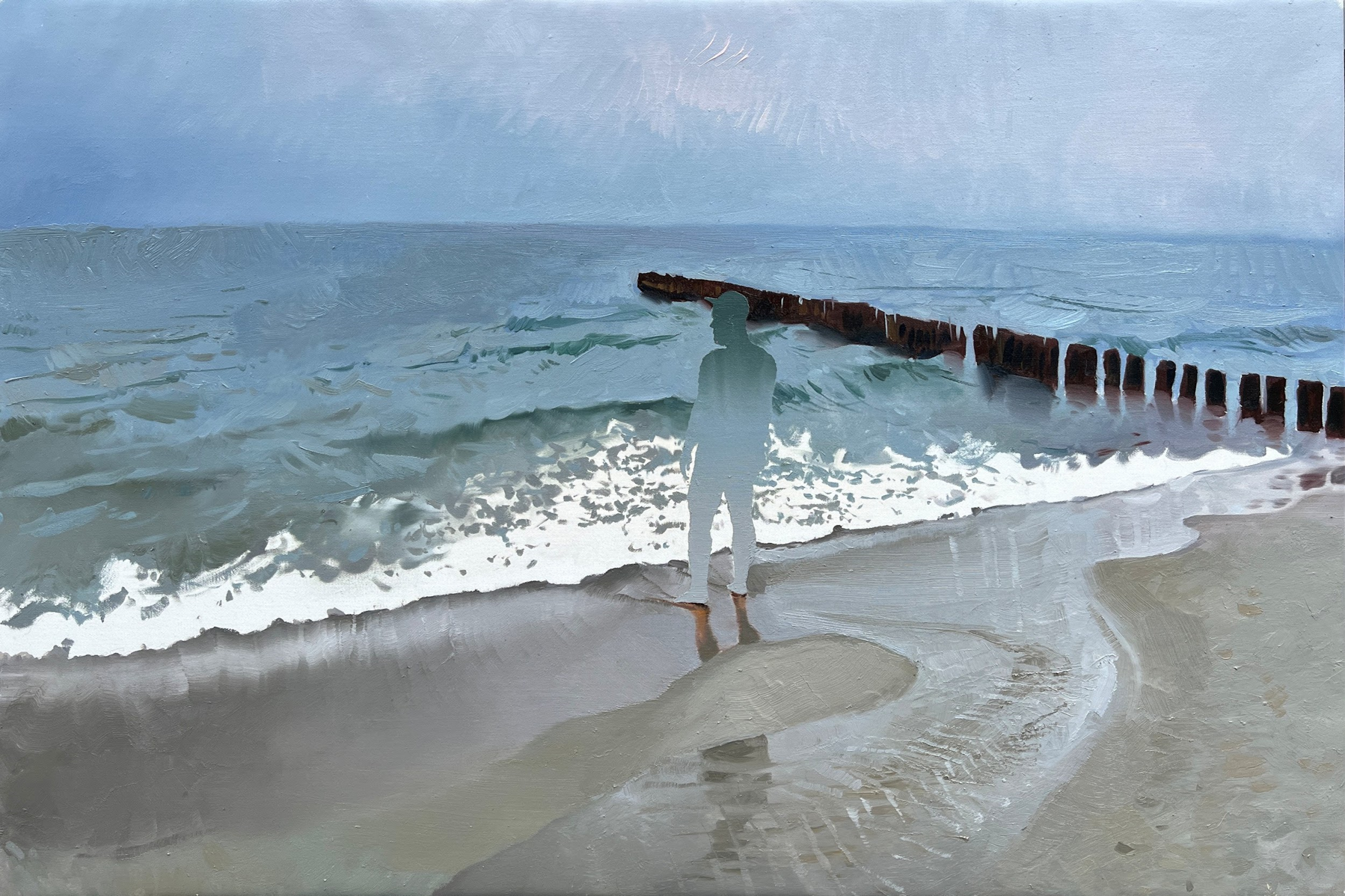 pejzaż morski, człowiek stojący na plaży patrzy na wzburzone morze