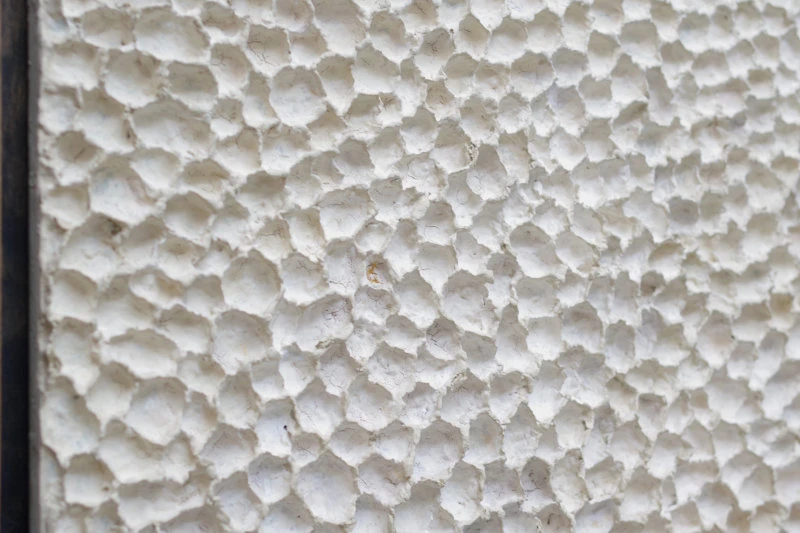 Detal  nowoczesnego obrazu z wyrazistą strukturą organiczną.