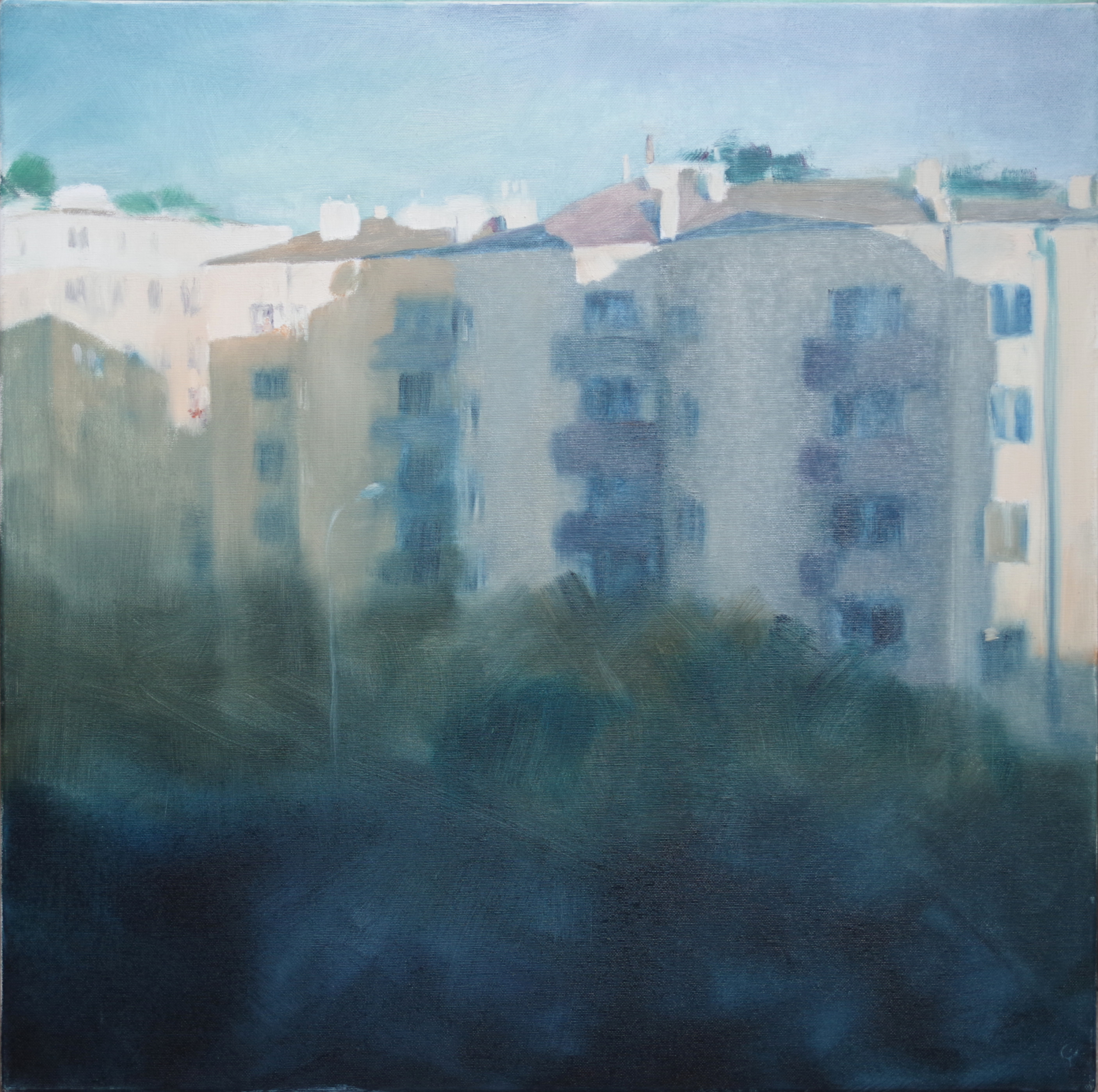 pejzaż miejski, wysokie bloki mieszkalne wyłaniające się nad koronami drzew