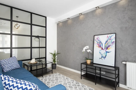 Nowoczesna abstrakcja na szarej ściany we wnętrzu w stylu Bauhaus